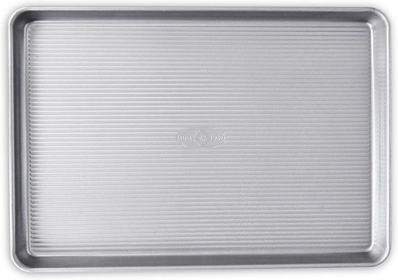 Photo 1 of ***DENTED*** USA Pan Bakeware Half Sheet Pan, Warp Resistant Nonstick Baking Pan, Made in the USA from Aluminized Steel 