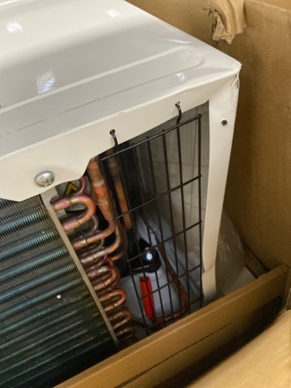 Photo 3 of ***SEE PHOTOS FOR DAMAGES*** Whirlpool 12,000 BTU Through the Wall Air Conditioner, 115V, Cools up to 550 Sq. Ft for Living Room, Bedroom, Kitchen, Apartment, with Dehumidifier, Remote Control, Digital Display, 24H Timer, White