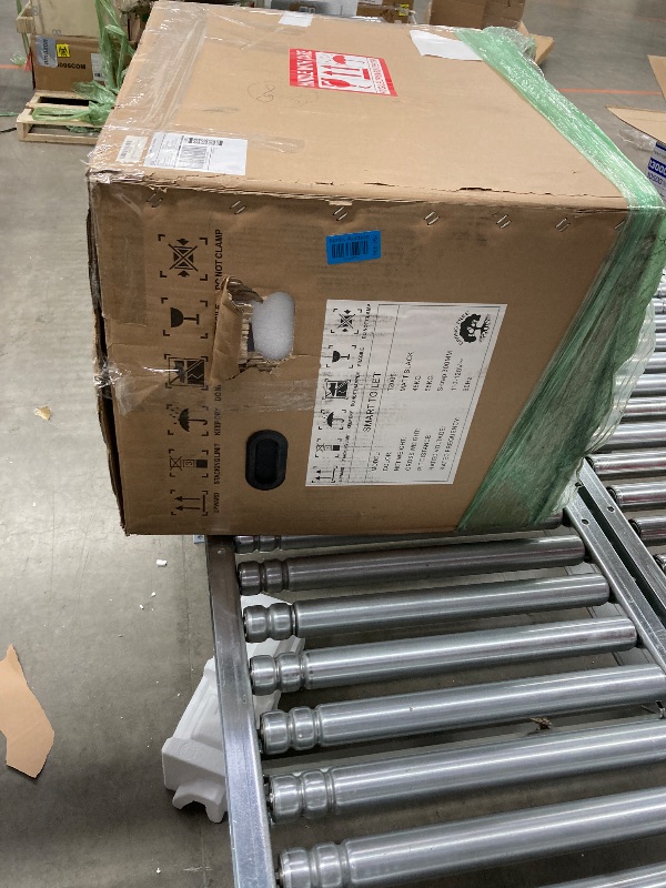 Photo 1 of Smart Bidet Toilet for Bathroom with Remote Control, Modern Intelligent One Piece Tankless Toilet with Auto Open/Close Lid, Auto Dual Flush, Heated Bidet Seat, Warm Water and Dry.