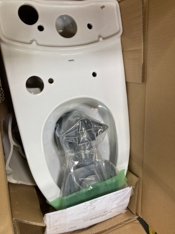 Photo 3 of ***MISSING TOILET TANK*** TOTO Drake Two-Piece Round 1.28 GPF Universal Height TORNADO FLUSH Toilet with CEFIONTECT, Cotton White - CST775CEFG#01