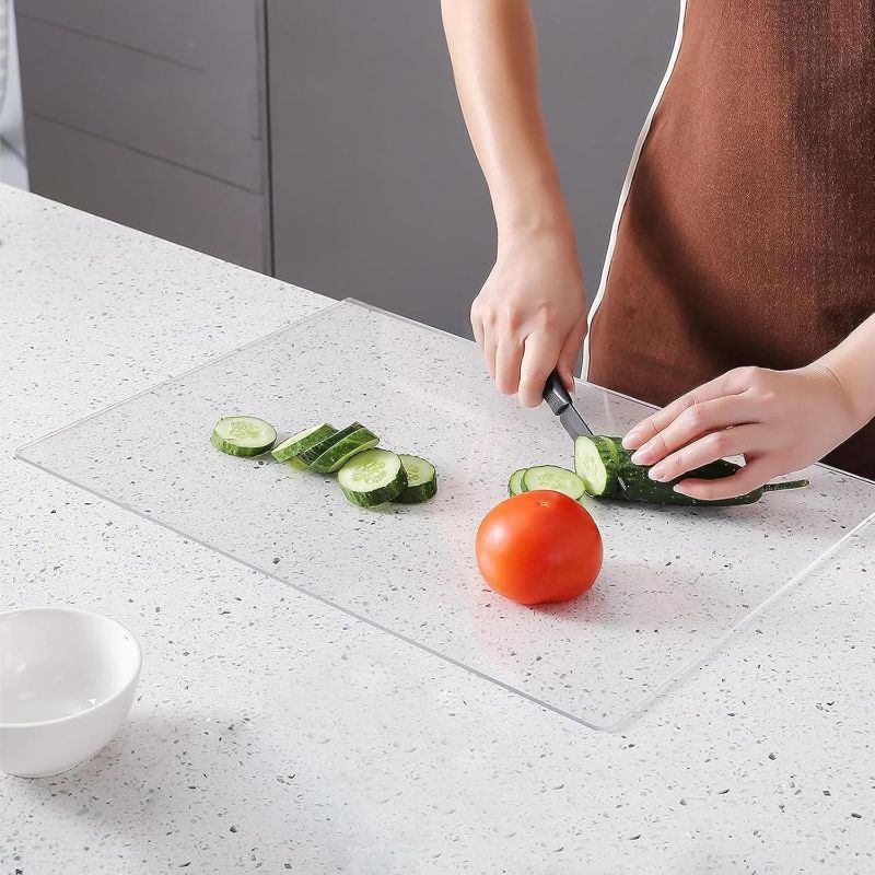 Photo 1 of Acrylic Cutting Board with Counter Lip, Clear Non slip Acrylic Cutting Board for Kitchen Countertop Protection(12.8"X16.7")
