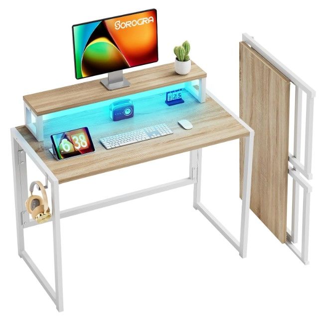 Photo 1 of Computer Desk Small Foldable Desk 31.5 inch with Led Lights for Small Space Computer Gaming Table with Monitor Shelf for Home Office Bedroom, Easy Assembly, Oak

***New, factory sealed.
