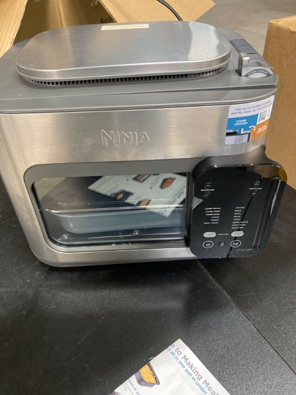 Photo 2 of Ninja Combi All-in-One Multicooker, Oven, & Air Fryer, Complete Meals in 15 Mins, 14-in-1 Functions, Combi Cooker + Air Fry, Bake, Roast, Slow Cook and More, 3 Accessories, Stainless Steel, SFP701
