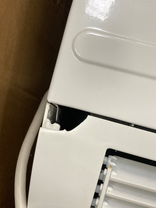 Photo 1 of  ***(SELLING AS IS***FRONT TOP LEFT FRAME CHIPPED, RIGHT SIDE DENTED/BENT, STICKER RESIDUE, SOME SCUFFS/SCRATCHES, NO REMOTE)***  
Profile AHTT06BC GE Clearview Air Conditioner 6,100, WiFi Enabled, Ultra Quiet for Small Rooms up to 250 Sq. FT, Full Window