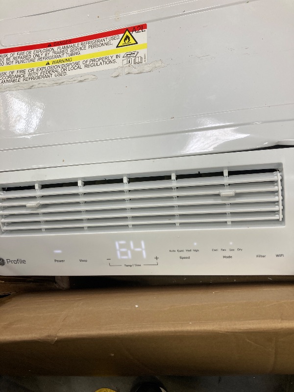 Photo 1 of  ***(SELLING AS IS***FRONT TOP LEFT FRAME CHIPPED, RIGHT SIDE DENTED/BENT, STICKER RESIDUE, SOME SCUFFS/SCRATCHES, NO REMOTE)***  
Profile AHTT06BC GE Clearview Air Conditioner 6,100, WiFi Enabled, Ultra Quiet for Small Rooms up to 250 Sq. FT, Full Window