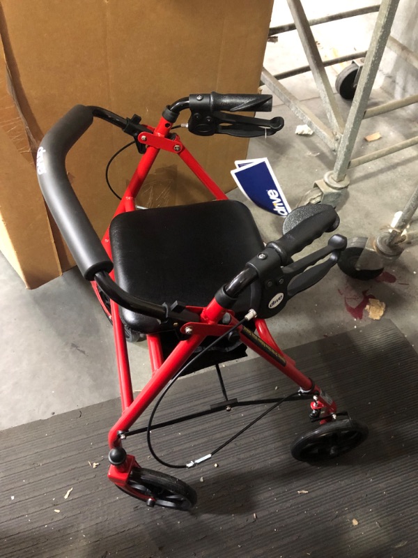 Photo 2 of ***MISSING PARTS - SEE COMMENTS***
Medline Lightweight Transport Wheelchair with Handbrakes, Folding Transport Chair for Adults has 12 inch Wheels, Red