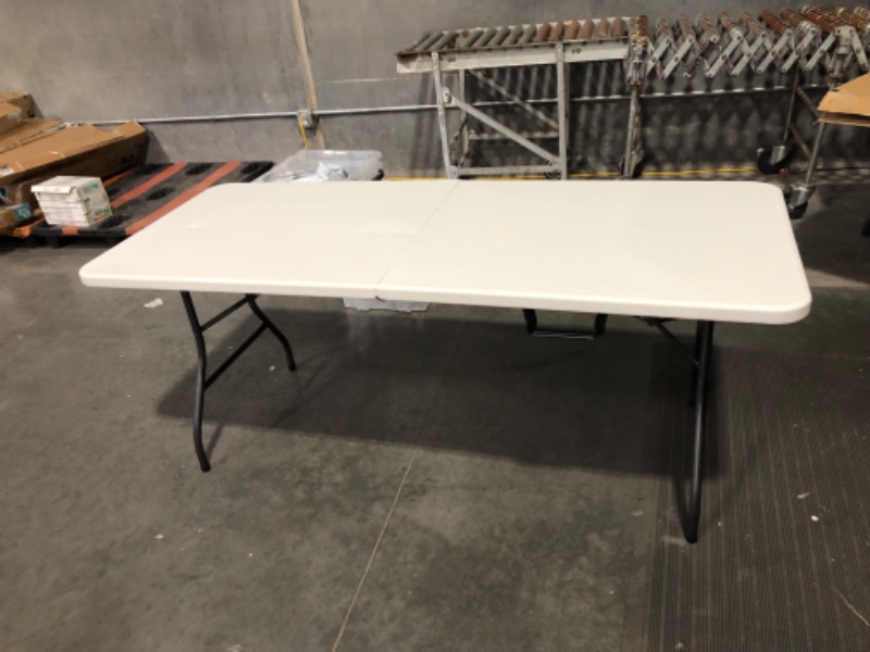 Photo 5 of ***DAMAGED - DENTED - SEE PICTURES***
Cosco Folding Table, 6 Foot, White White 6 Foot, 29.63"D x 72"W x 29.25"H