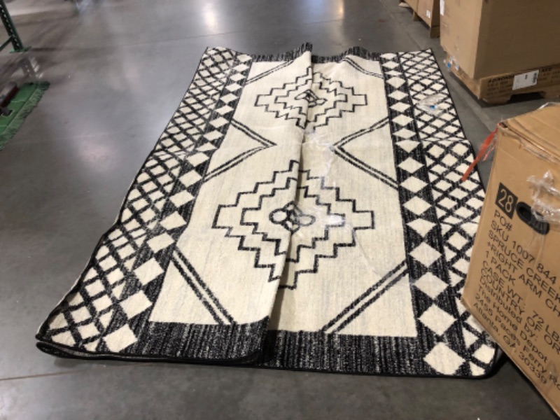 Photo 2 of ***USED - DIRTY - NO PACKAGING***
JONATHAN Y MOH200A-13 Amir Moroccan Beni Souk Area Rug, Bohemian, Scandinavian, Transitional, Rustic for Bedroom, Kitchen, Living Room, Easy-Cleaning, Cream/Black, 10 ft. x 13 ft.