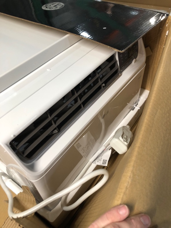 Photo 5 of **small crack** LG 9,500 BTU DUAL Inverter Smart Window Air Conditioner, Cools 450 Sq. Ft., Ultra Quiet Operation