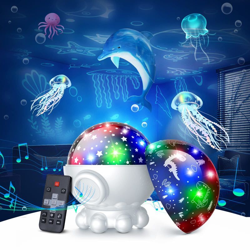 Photo 1 of Night Light Projector,Ocean Star Night Light for Kids Room,Dinosaur Toys with 360° Rotation,Remote and Timer,3 Projection Films,17 Light Modes,9 Lullaby Songs,Birthday Christmas Gifts Kids Toys-White