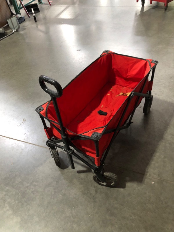 Photo 2 of ***HEAVILY USED AND DIRTY - NO PACKAGING***
Ozark Trail Outdoor Quad-Folding Adult Use Wagon with Telescoping Handle, Red, 35.43"D x 18.9"W x 21.65"H