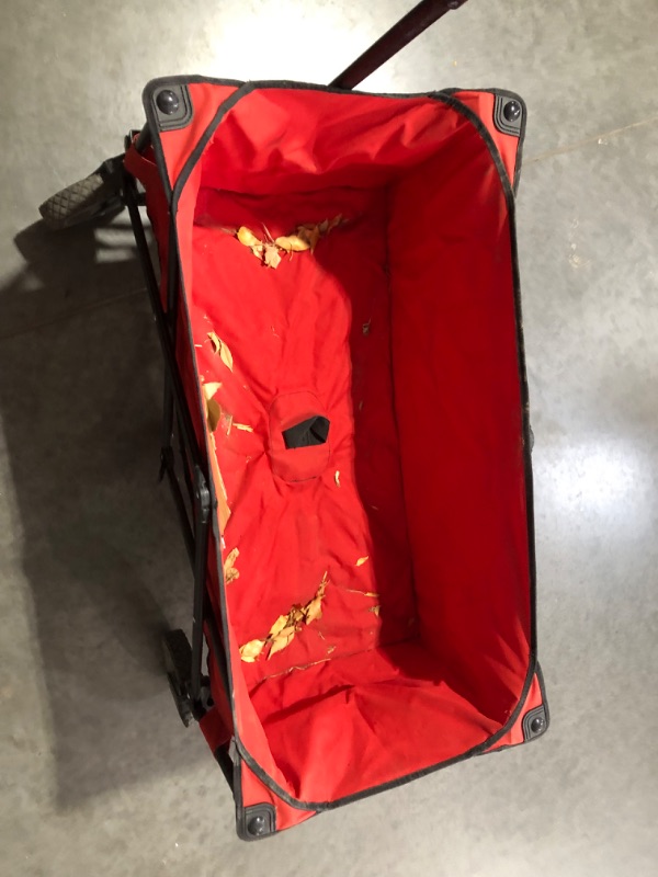 Photo 4 of ***HEAVILY USED AND DIRTY - NO PACKAGING***
Ozark Trail Outdoor Quad-Folding Adult Use Wagon with Telescoping Handle, Red, 35.43"D x 18.9"W x 21.65"H