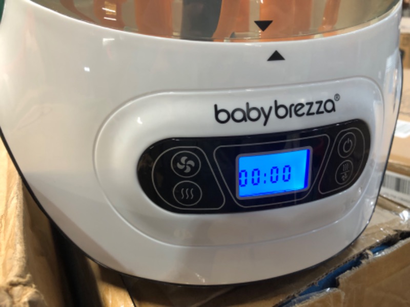 Photo 3 of Baby Brezza Baby Bottle Sterilizer and Dryer Machine – Electric Steam Sterilization - Universal Fit - Pacifiers, Glass, Plastic, and Newborn Feeding Bottles