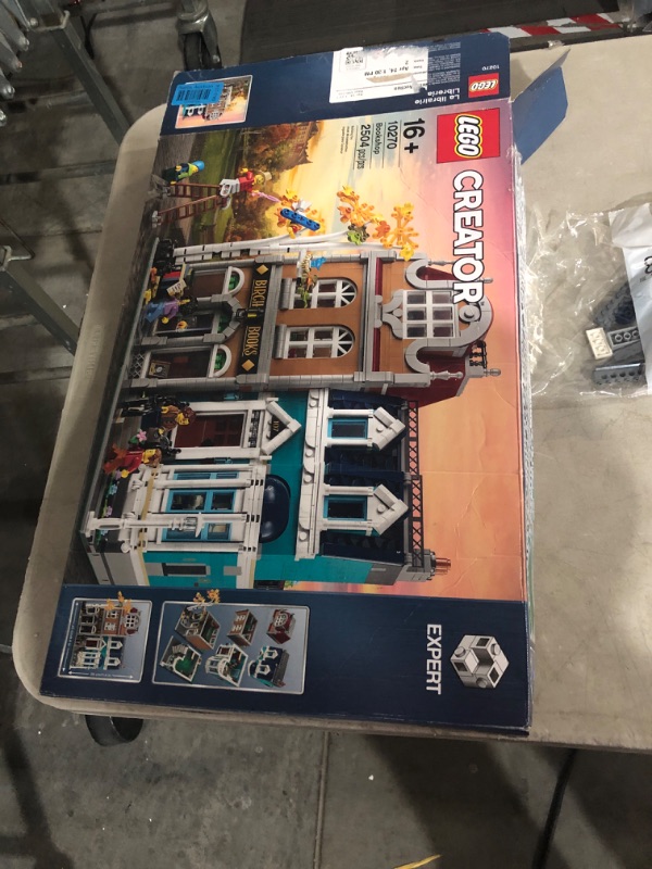 Photo 6 of ***USED*DAMAGE TO BOX*UNKNOWN IF MISSING PIECES*BAGS APPEAR TO BE SEALED***
LEGO Creator Expert Bookshop 10270 Modular Building Kit, Big Set and Collectors Toy for Adults (2,504 Pieces) Standard Packaging