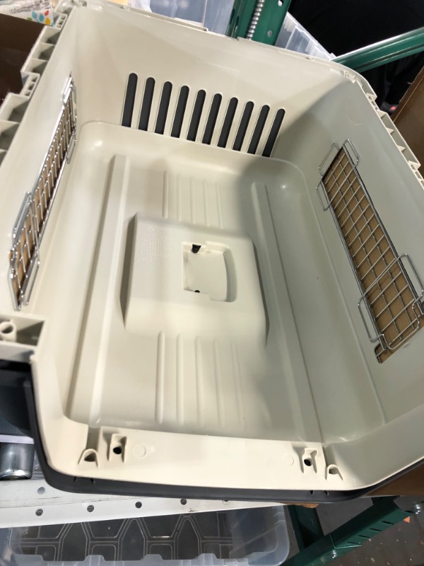 Photo 5 of ***MINOR DAMAGE**SIDE OF LID IS CRACKED*PICTURED***
SportPet Designs Plastic Kennels Rolling Plastic Wire Door Travel Dog Crate - Medium, Gray (CM-2001-CS01)