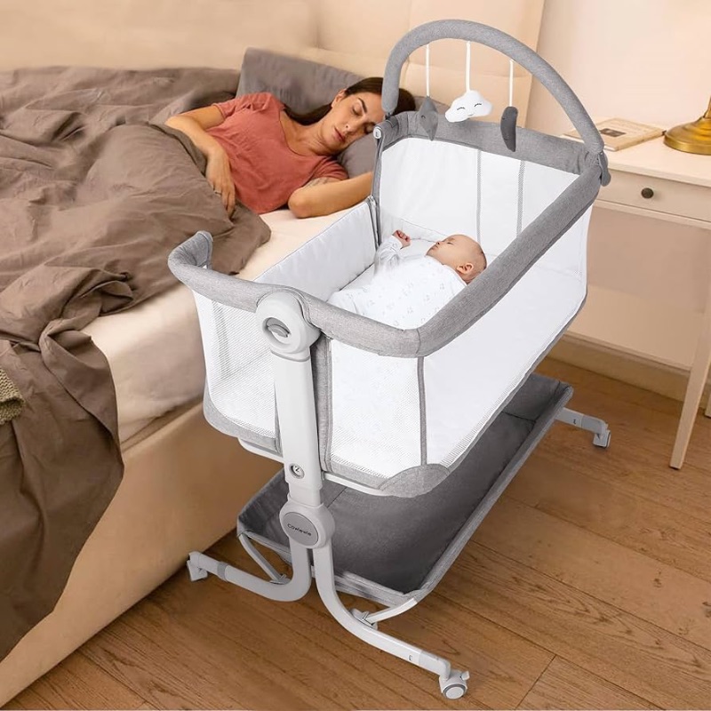 Photo 1 of Cowiewie Baby Bassinet 2-1 Beside Sleeper with Wheels & Hanging Toys for Baby Foldable