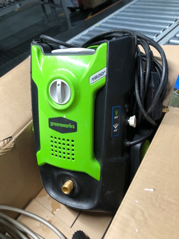Photo 1 of ***USED - MISSING NUMEROUS PARTS - UNABLE TO TEST - PLASTIC CRACKED - SEE PICTURES***
Greenworks 1600 PSI (1.2 GPM) Electric Pressure Washer (Ultra Compact / Lightweight / 20 FT Hose / 35 FT Power Cord) Great For Cars, Fences, Patios, Driveways
