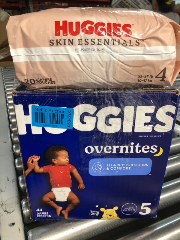 Photo 2 of DIAPER BUNDLE* NONREFUNDABLE* Huggies Size 4 Diapers, Skin Essentials Baby Diapers, Size 4 (22-37 lbs), 20 Count & Huggies Size 5 Diapers, Little Snugglers Baby Diapers, Size 5, 44 Count
