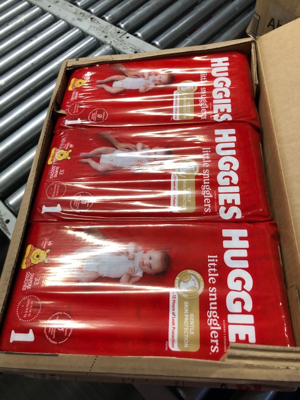 Photo 3 of Huggies Little Snugglers Baby Diapers, Size 1 (8-14 lbs), 198 Ct, Newborn Diapers Size 1 198