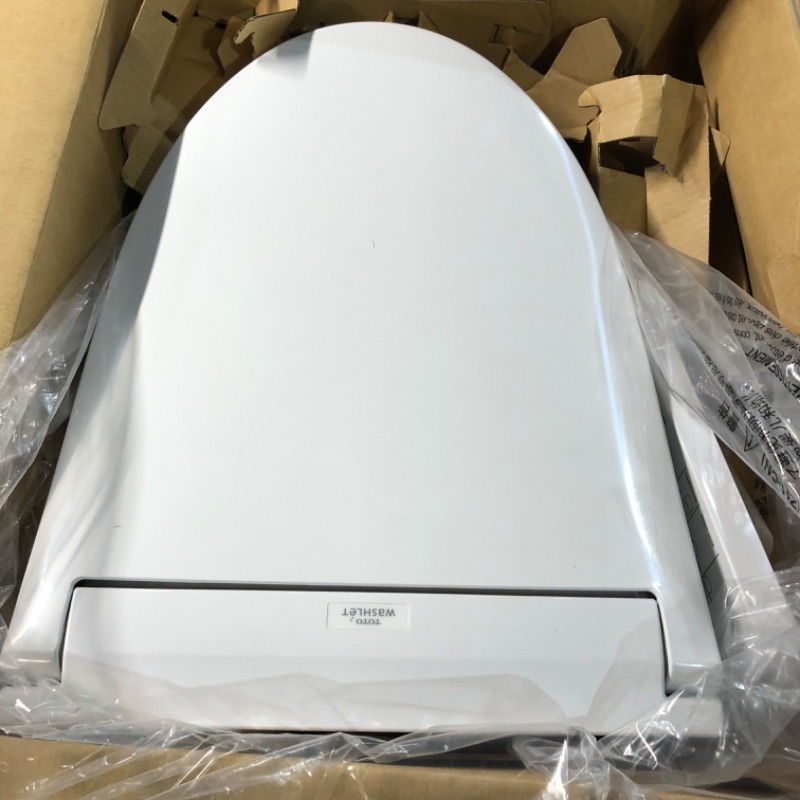 Photo 4 of ***MAJOR DAMAGE - SEE PICTURES - UNABLE TO TEST - LIKELY MISSING PARTS***
TOTO SW3074#01 WASHLET C2 Electronic Bidet Toilet Seat with PREMIST and EWATER+ Wand Cleaning, Elongated, Cotton White C2 Elongated Cotton White