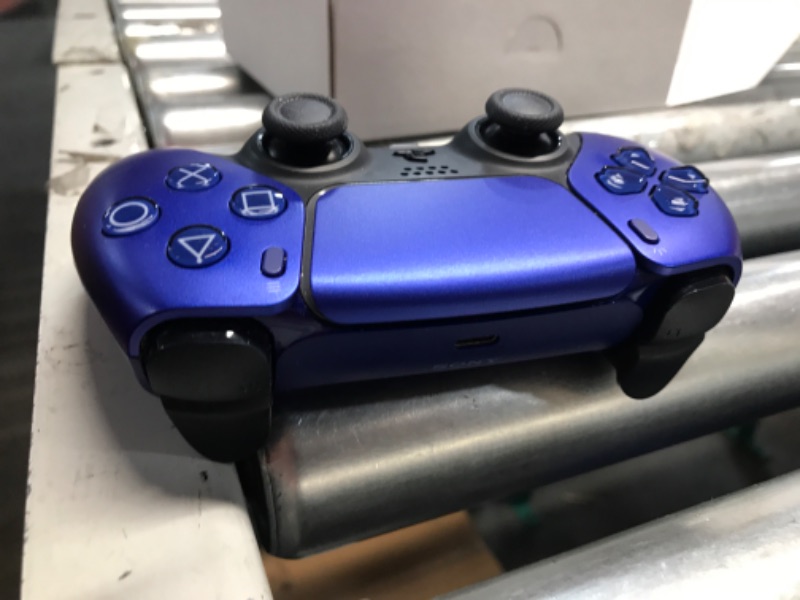 Photo 4 of **LOOKS USED** PlayStation DualSense Wireless Controller - Cobalt Blue