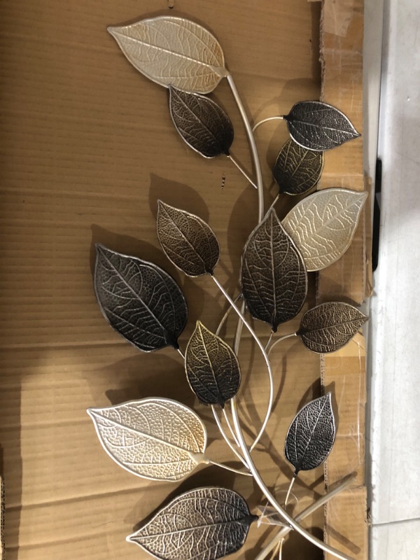 Photo 3 of ***USED*ONE LEAF HAS BROKEN OFF*PICTURED***
Deco 79 Metal Leaf Long Textured Wall Decor with Multiple Shades, 50" x 2" x 15", Bronze