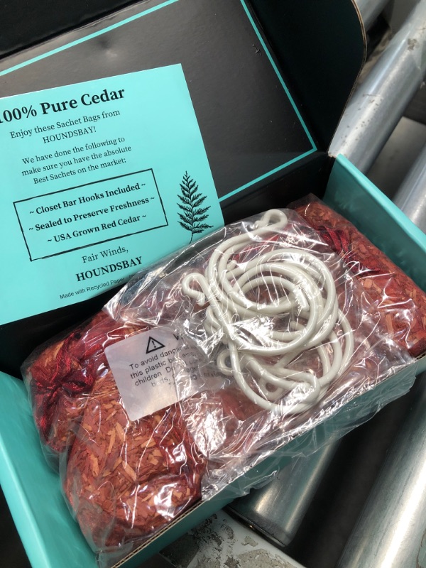 Photo 1 of Cedar Sachet Bags, Fully Stuffed Scented Sachets with Hanger Hooks, Perfect for Closets, Drawers, Cars, Gym Bags, or Anyplace That Needs to Smell Better (10 Cedar Sachets)