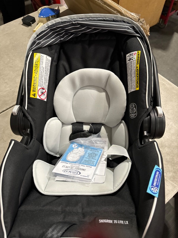 Photo 1 of **USED LIKE NEW**Graco SnugRide 35 Lite LX Infant Car Seat, Studio SnugRide 1 Count (Pack of 1) Studio