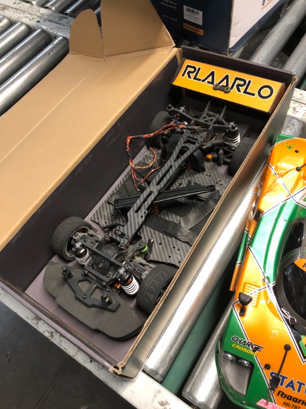 Photo 5 of *NON REFUNDABLE ITEM**(FOR PARTS ONLY)
AMORIL 1/10 AK-787 Carbon Fiber On-Road Drift Car Roller,4WD Racing Rally Car Roller for Adults and Kids,Electric Touring Vehicle Chassis Frame Body Without Electric Parts Orange