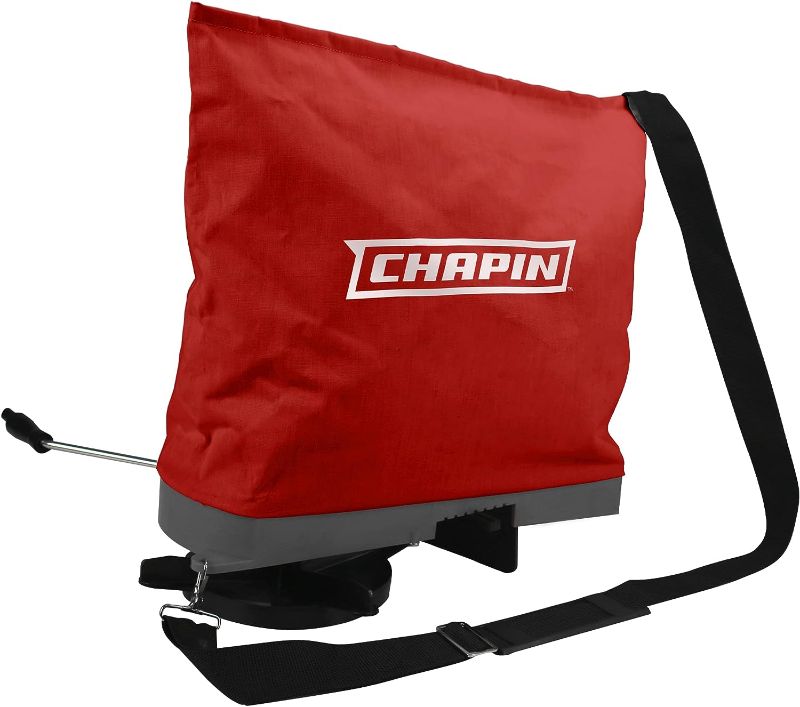 Photo 1 of Chapin 84700A 25-Pound Professional Handheld Bag Seed spreader with Waterproof Bag, Enclosed Gears, Rear Baffle, Adjustable Shoulder Strap and Multiple Spread Options, Red, 1.0 Count
