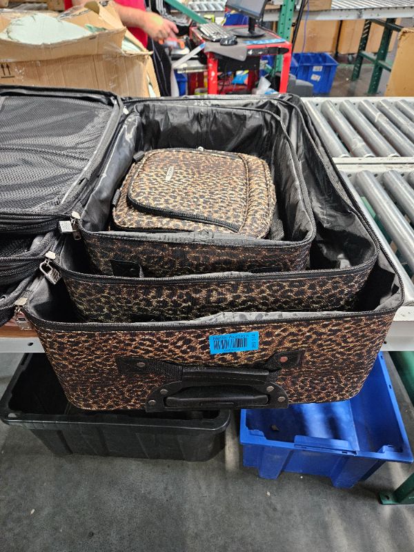 Photo 3 of Rockland Jungle Softside Upright Luggage, Leopard, 4-Piece Set (14/19/24/28)