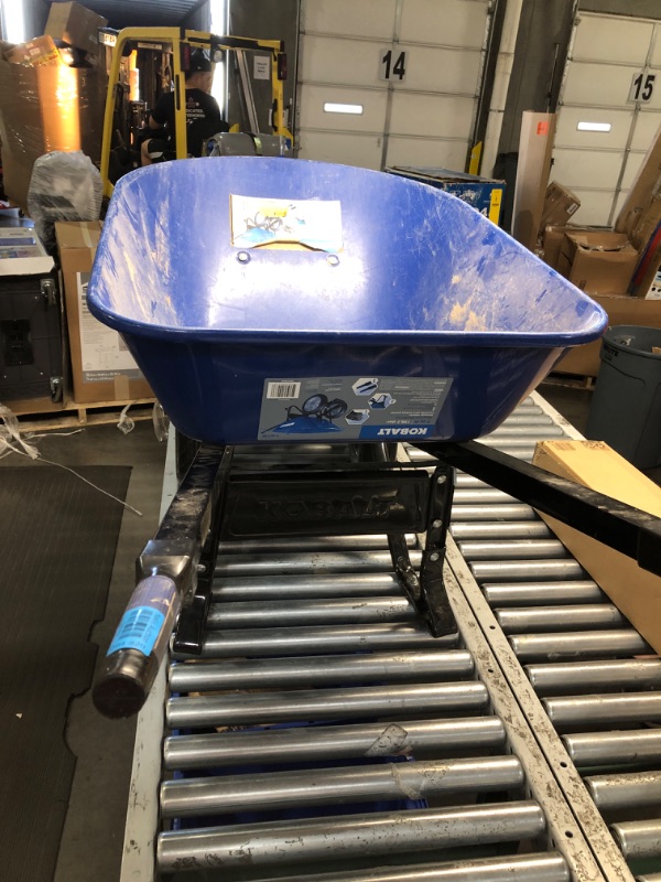 Photo 2 of **DIRTY**
Kobalt Steel Wheelbarrow with Flat Free Tire - Blue - 7 Cu ft - Each