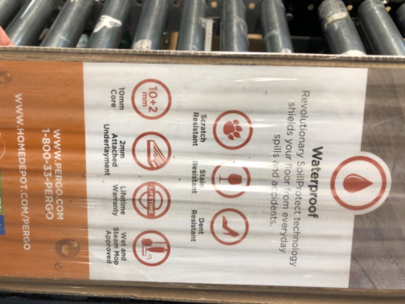 Photo 1 of **PALLET OF 42 CASES** Pergo Outlast+ 6.14 in. W Honeysuckle Oak Waterproof Laminate Wood Flooring (16.12 Sq. ft./Case)