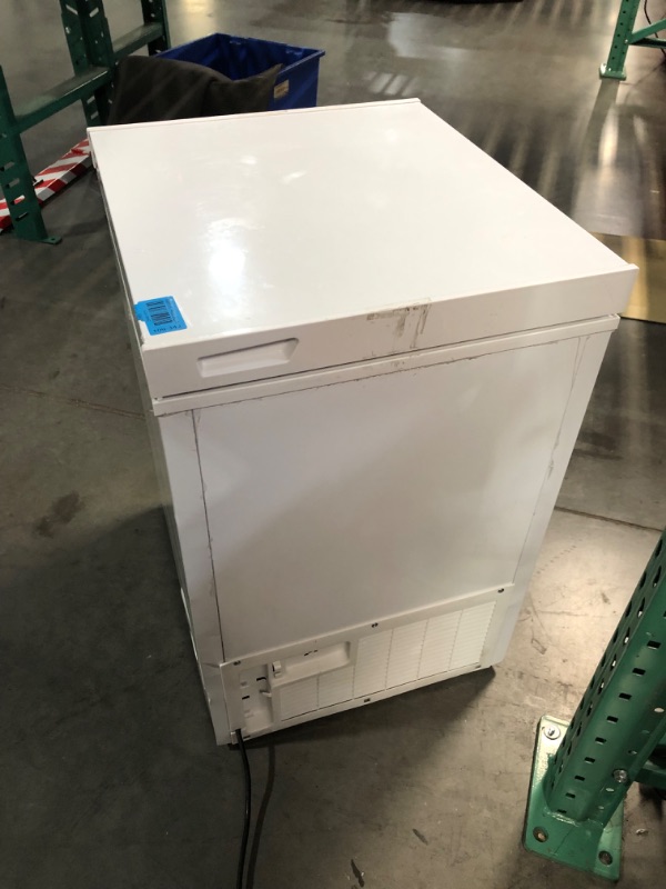 Photo 9 of ***USED - MAJOR DAMAGE - COVERED IN DENTS - NO PACKAGING - UNABLE TO TEST***
Compact Chest Freezer, 3.5 Cu.Ft. Deep Freezer with Dividers and Basket, Manual Temperature Control, for Home Use, White, 22.1"D x 23.5"W x 31.9"H