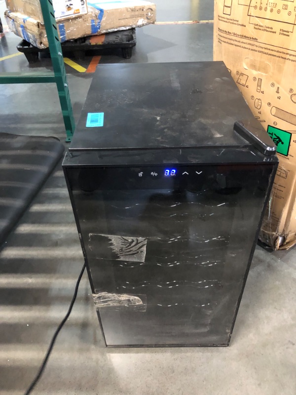 Photo 2 of ***USED - DIRTY - NO PACKAGING - POWERS ON - UNABLE TO TEST FURTHER - SEE PICTURES***
Ivation 18 Bottle Thermoelectric Red And White Wine Cooler/Chiller Counter Top Wine Cellar with Digital Temperature Display, Freestanding Refrigerator Smoked Glass Door 