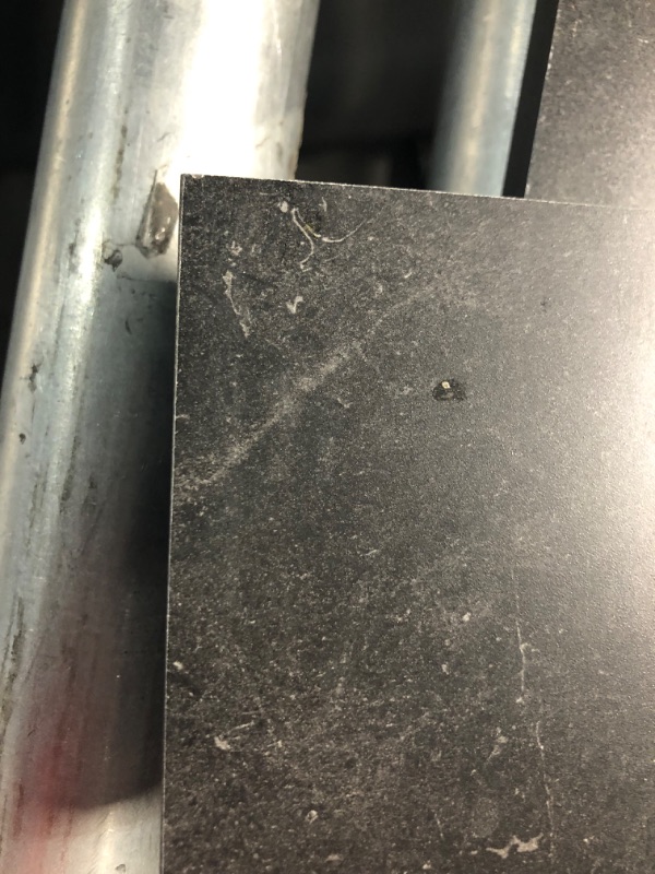 Photo 4 of ***USED - SCRATCHED AND SCRAPED - NO PACKAGING - SEE PICTURES***
6 ft. L x 25 in. D Engineered Composite Countertop in Black Amani with Satin Finish