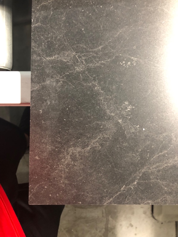 Photo 2 of ***USED - SCRATCHED AND SCRAPED - NO PACKAGING - SEE PICTURES***
6 ft. L x 25 in. D Engineered Composite Countertop in Black Amani with Satin Finish