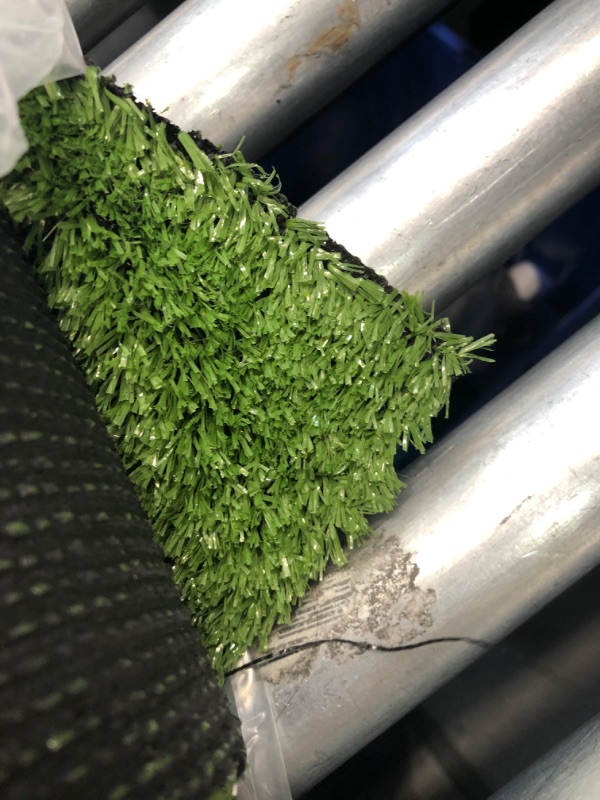 Photo 1 of ***UNABLE TO IDENTIFY EXACT ITEM - STOCK PHOTO FOR REFERENCE ONLY - ACTUAL ITEM MAY DIFFER***
Artificial Grass Turf Runner, 5 Foot Width, Unknown Length, Green/Black