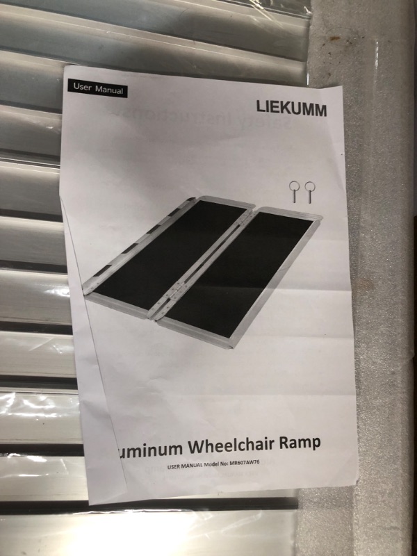 Photo 1 of LIEKUMM 4ft Wheelchair Ramp with Non-Slip Surface, Portable Aluminum Threshold Ramp, 600LBS Capacity, using height range: 4.8"-11.9"?