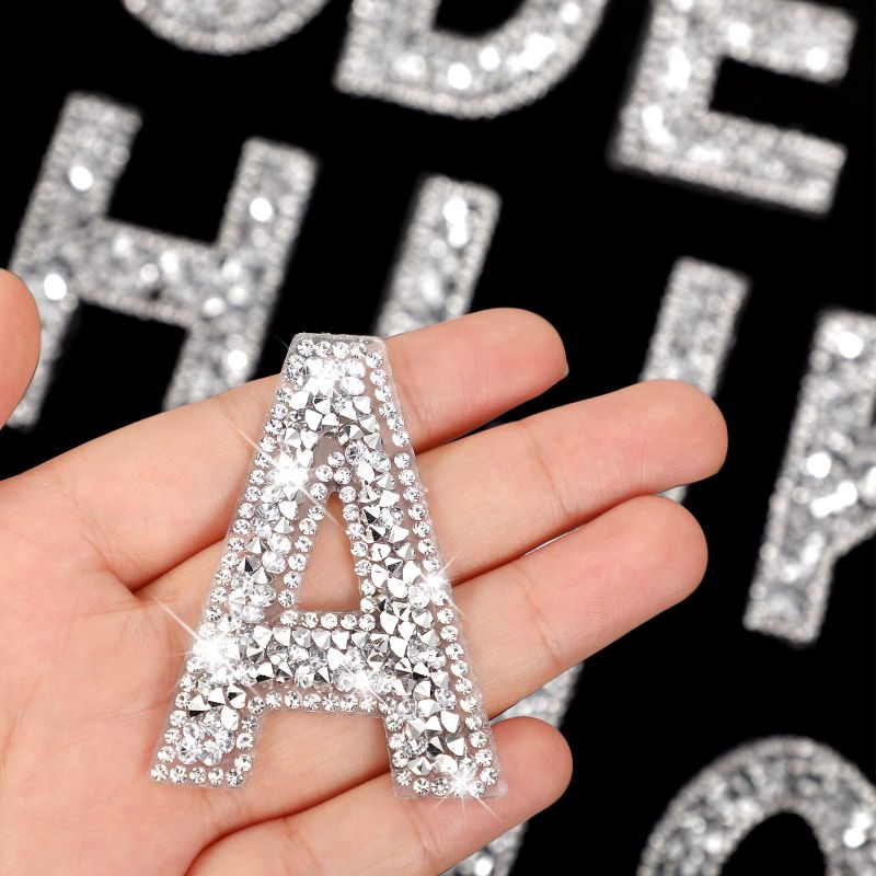 Photo 1 of 26 Piece Rhinestone Iron On Patch A-Z White Pearl Bling Rhinestone Letter Patch Glitter Alphabet Applique Rhinestone Pearl English Letter for DIY Craft Supplies(Silver,Solid Style) Solid Style Silver