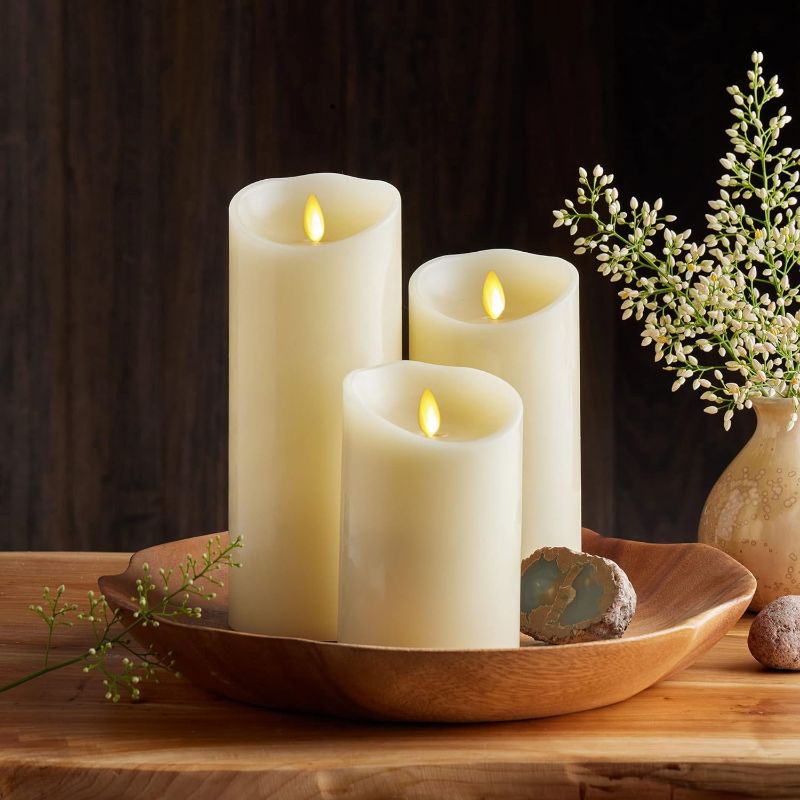 Photo 1 of  Realistic Moving Flame LED Candle Scalloped Edge Smooth Finish Real Wax Pillar, Battery Operated (2 D) 1000 Hr Runtime, Timer, Remote Ready, Unscented - Ivory (3.5" x 8.75")