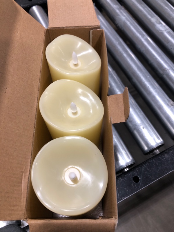 Photo 2 of  Realistic Moving Flame LED Candle Scalloped Edge Smooth Finish Real Wax Pillar, Battery Operated (2 D) 1000 Hr Runtime, Timer, Remote Ready, Unscented - Ivory (3.5" x 8.75")