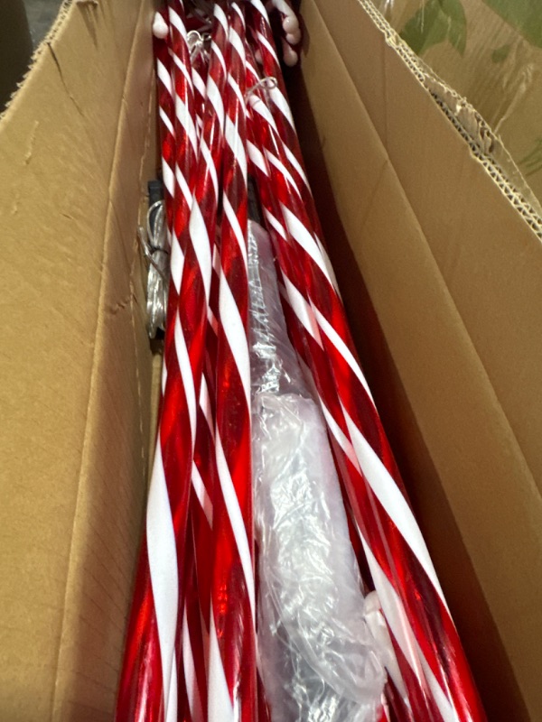 Photo 1 of Treela 4 Sets 36 Inch Christmas Candy Cane Pathway Markers 24 Pcs Christmas Walkway Stakes Lights Connectable Lighted Pathway Lights for Xmas Holiday Party Outdoor Patio Yard Garden, White and Red