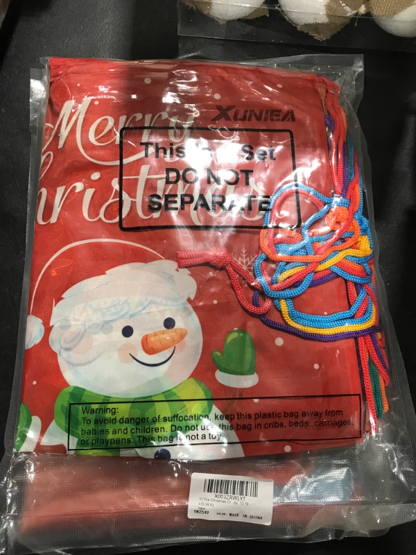 Photo 2 of 12 Pcs Christmas Drawstring Bags Bulk Favor Bags Christmas Gift Bags Reindeer Snowman Snowflakes Santa Claus Holiday Goody Treat Bags for Kids Xmas Winter Party Wrapping (Happy, 13.19 x16.34 In)