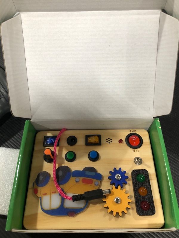 Photo 1 of Auney Montessori Busy Board with Traffic Led Lights,Wooden Sensory Toys for Toddlers 1,Baby Travel Toys with 7 Different Led Lights Sound Button,Educational Toys for 1+ Year Old Boy Car Style Gift