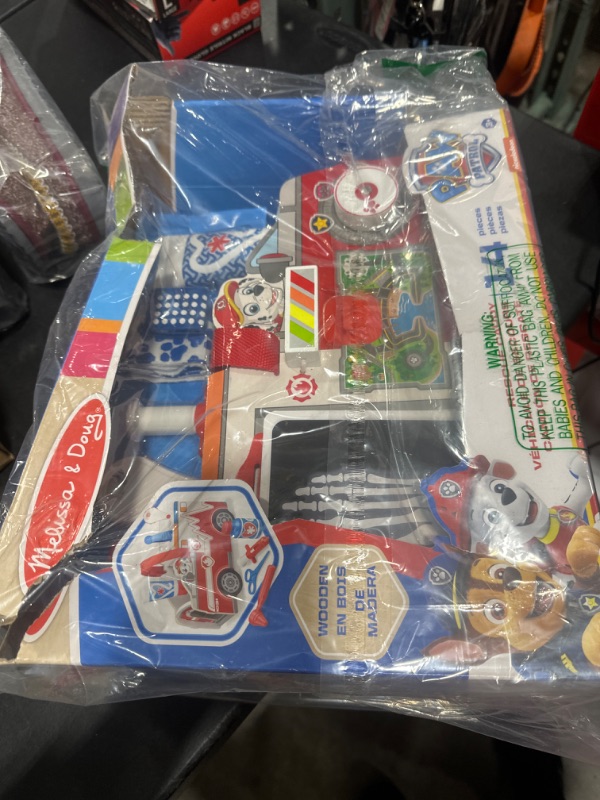 Photo 2 of Melissa & Doug PAW Patrol Marshall's Wooden Rescue EMT Caddy (14 Pieces) - PAW Patrol Take-Along Pretend Play First Responder Rescue Kit, PAW Patrol Toddler Toy For Girls And Boys Ages 3+