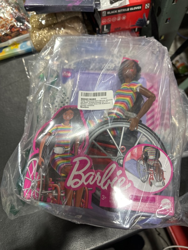 Photo 2 of Barbie Fashionistas Doll #166 with Wheelchair and Ramp, Crimped Brunette Hair and Rainbow-Striped Dress with Accessories (Amazon Exclusive) Rainbow Stripes