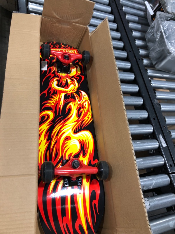 Photo 2 of Tony Hawk 31 Inch Skateboard, Tony Hawk Signature Series 4, 9-Ply Maple Deck Skateboard for Cruising, Carving, Tricks and Downhill Flame Hawk