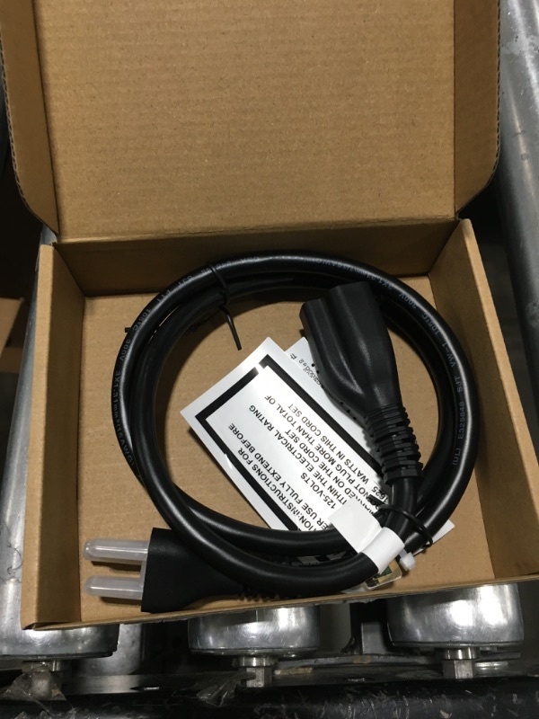 Photo 2 of Amazon Basics Extension Cord, 13 Amps, 125V, 3 Foot, Black Black 3-Foot Single Extension Cord