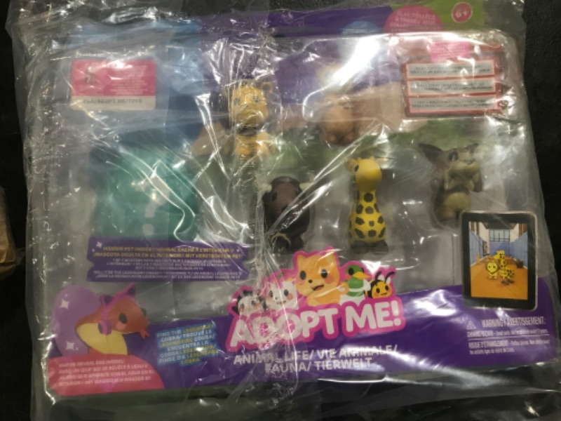 Photo 2 of Adopt Me! Pets Multipack Animal Life - Hidden Pet - Top Online Game, Exclusive Virtual Item Code Included - Fun Collectible Toys for Kids Featuring Your Favorite Pets, Ages 6+
